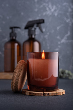 Spa composition with burning candle and recycled dispenser bottles for natural cosmeticの写真素材