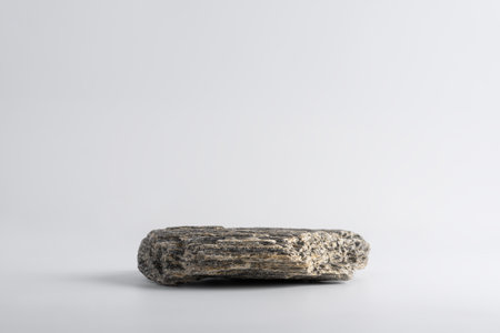 Stone podium or Product display on a gray background. Natural beauty pedestal for packaging presentation and cosmetic.の写真素材