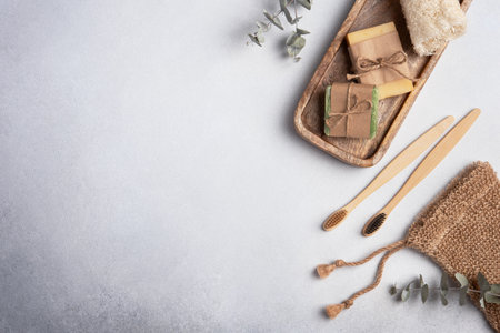 Eco-friendly bathroom products. Homemade soap, loofah, washcloth and bamboo toothbrushes. Bathroom and spa accessories for sustainable lifestyle. Zero waste concept.の写真素材