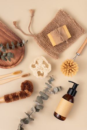 A collection of personal care items including a bamboo toothbrush, soap bar, clean brush, reusable bottle. Zero waste sustainable lifestyle concept.の写真素材