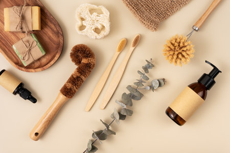 A collection of personal care items including a bamboo toothbrush, soap bar, clean brush, reusable bottle. Zero waste sustainable lifestyle concept.の写真素材