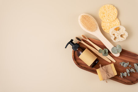 Set of personal care items including a bamboo toothbrush, soap bar, clean brush and reusable bottle for homemade cosmetic products. Zero waste sustainable lifestyle concept. Eco friendly wellness and self care.の写真素材