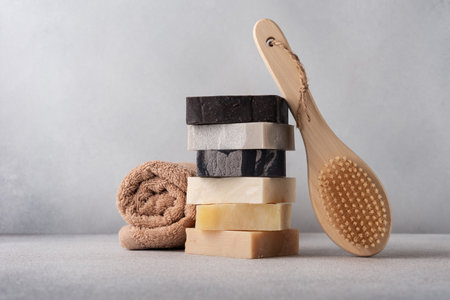 Handcraft organic soap bars and cotton towel. Bathroom and wellness concept.の写真素材