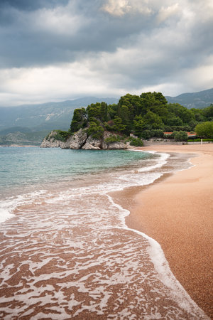 Amazing view of luxury empty beach near island Sveti Stefan, Budva, Montenegro.の写真素材