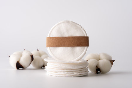 Reusable make-up remover cotton pads. Minimalist and sustainable concept for an ethical, zero-waste self-care routine.の写真素材