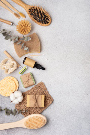 Aesthetic flat lay of eco-friendly body care, bath and beauty products including bamboo brushes, soap, and glass bottles.  Perfect for sustainable living, wellness, and natural beauty themes.の写真素材