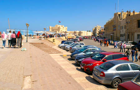 Alexandria - Egypt - October 08, 2020: Beautiful old Fortress, Citadel of Qaitbay with many people. Crowded historical place with museums and Citadel in Alexandria during feast time.のeditorial素材