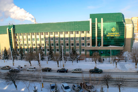 Kostanay - Kazakhstan -  January 15, 2021: Halyk bank building exterior on blue sky background in winter time. National Savings Bank of Kazakhstan Joint-Stock Companyのeditorial素材