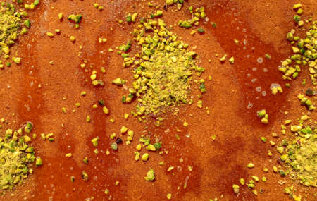 Traditional eastern dessert kunafa. Top view of arabic mixed cheese kunafa background. Konafa backgroundの写真素材