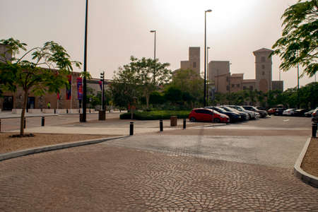 Dubai / UAE - March 9, 2020: Outlet village with parking next to it. New shopping mall in Dubai.