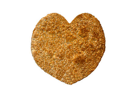 Chia flat bread in a heart shape isolated on white background, top view. Healthy chia bread.の写真素材