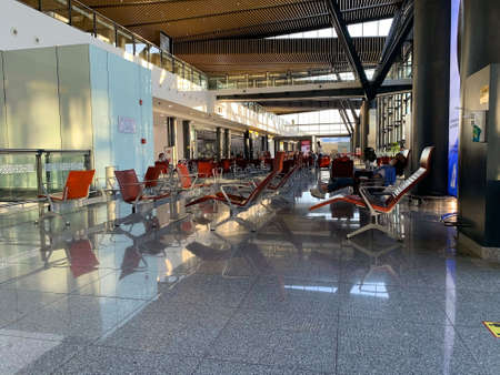 Nur-Sultan - KAZAKHSTAN - September 5, 2021: The Astana Nursultan Nazarbayev International Airport, TSE in Nur Sultan. Departure hall of the airport full of peopleのeditorial素材