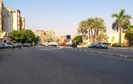 Cairo - Egypt - October 3, 2020: View of Cairo old historical residential district with trash, many buildings and main road. Capital City in Africa.のeditorial素材