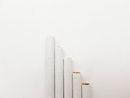 A few cigarettes on a white background. High quality photo