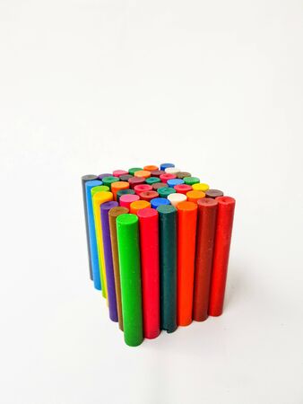 Cube of colored chalk pencils on a white background. High quality photo.の写真素材