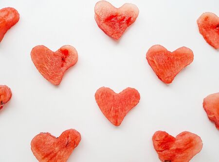 Bright juicy red watermelon in the form of a heart. Space for text. High quality photoの写真素材