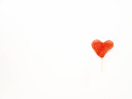 Bright juicy red watermelon in the form of a heart. Space for text. High quality photoの写真素材