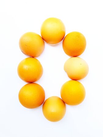 Yellow chicken eggs on a white background close-up background. Space for text. High quality photo