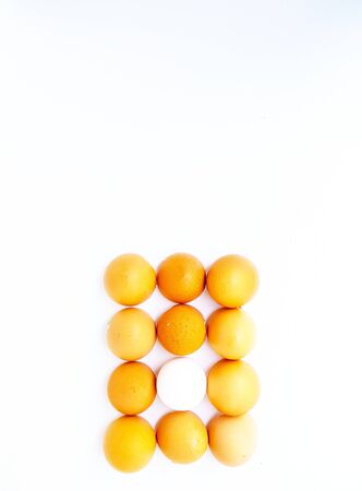 Yellow chicken eggs on a white background close-up background. Space for text. High quality photoの写真素材