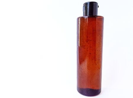 Cosmetic bottle containers in black on a white background with a blank label for the brand layout on a white background. Space for text. High quality photoの写真素材