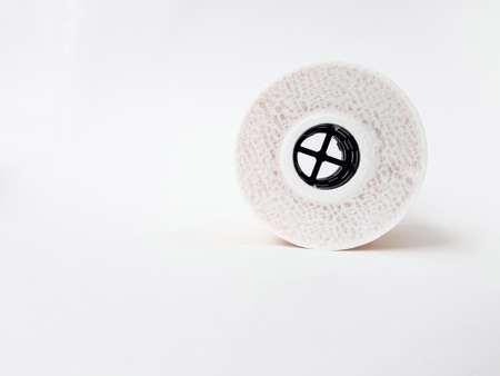 Car oil filter on a white background. Space for text. Isolate. High quality photo