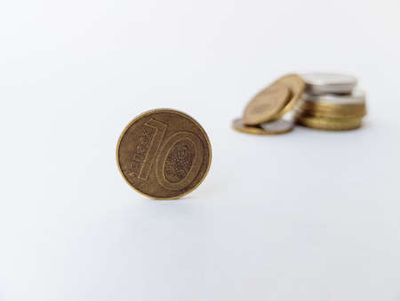 Belarusian coins on a white background of copper and alloys of metals. Folded with a stack. Saving....