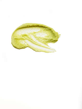 A drop of wasabi smeared on the surface on a white background is isolate. An artistic smear. High quality photoの写真素材