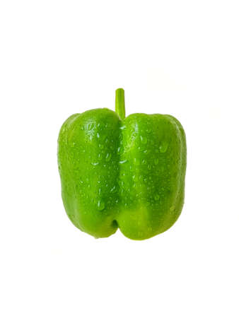 Green bell pepper on a white background. The concept of a healthy diet. . High quality photoの写真素材