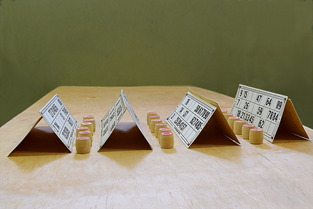 Composition of cards and lotto chips on the table.の写真素材