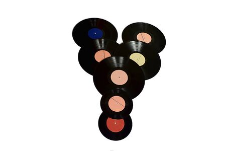Seven old vinyl records, isolate on a white background.