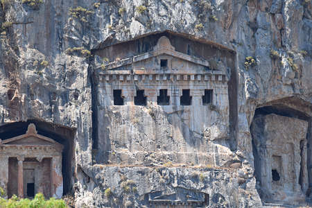Ancient Lycian tombs carved into the rocks (Dalaman, Turkey)の写真素材