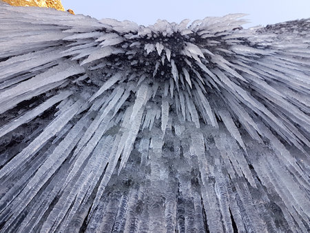 A rock near a waterfall covered with icicles. Iceland.の写真素材