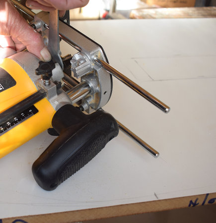 Installation of a cutter on a joiner's router.の写真素材