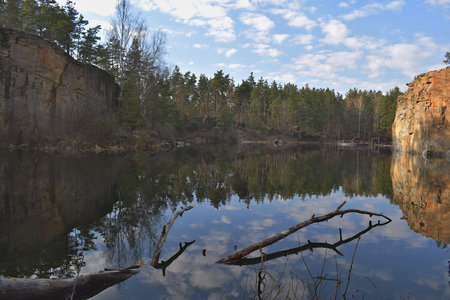 Abandoned granite quarry in the forest. Landscape.の写真素材
