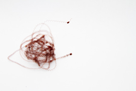 spiral wire tangled in a big tangle