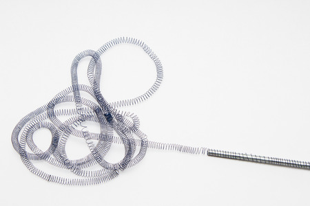 spiral wire tangled in a big tangle
