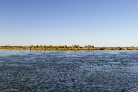 big river in the early morning in good weatherの写真素材