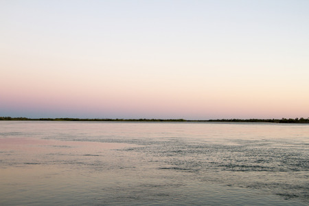 Dawn over the river in Kazakhstan on the Ili Riverの写真素材