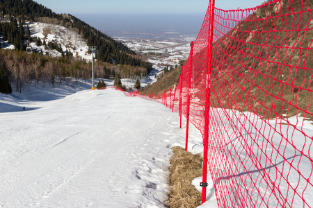snowy ski trails in the mountains of Trans-Ili Alatauの写真素材