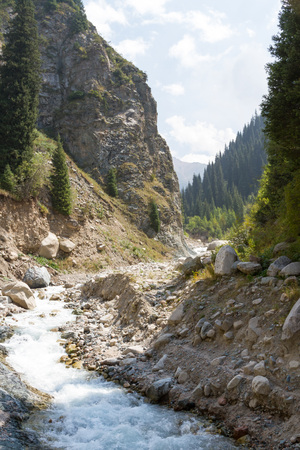 Kumbelsy mountain river in gorge near Almaty in Kazakhstanの写真素材