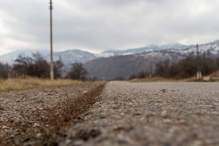 road in the mountains on a blurred backgroundの写真素材