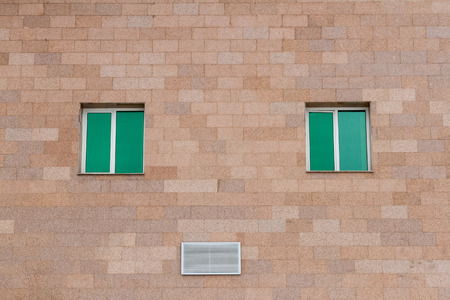 tinted windows on the facade of the building