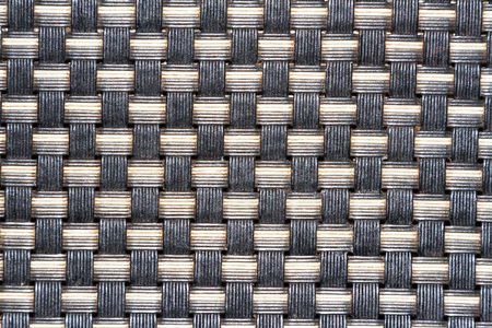 Interlacing of plastic threads in the fabricの写真素材