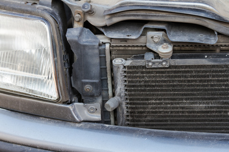 radiators and a headlight on an old carの写真素材