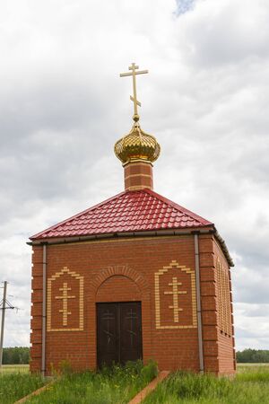 Chapel on the churchyard in the Russian villageの写真素材