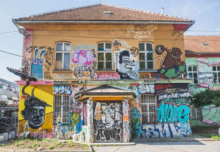 Ljubljana, Slovenia, September 2020: House painted with graffiti in Metelkova Art Center Sloveniaのeditorial素材