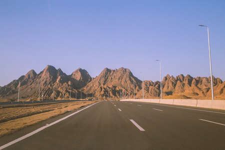 Highway in Egypt with mountain views in the evening