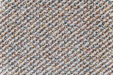 Background: old rough multicolored fabric with blank space for lettering