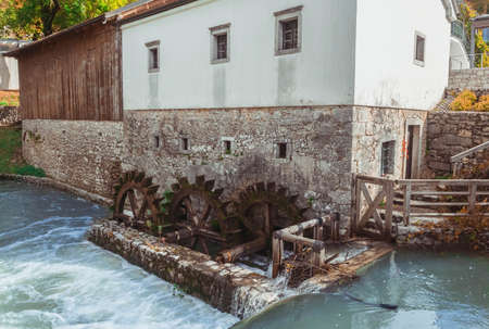 Old stone not working water mill in Sloveniaの写真素材