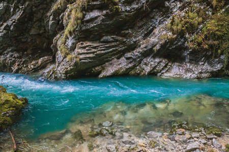Blue water in a mountain river in Sloveniaの写真素材